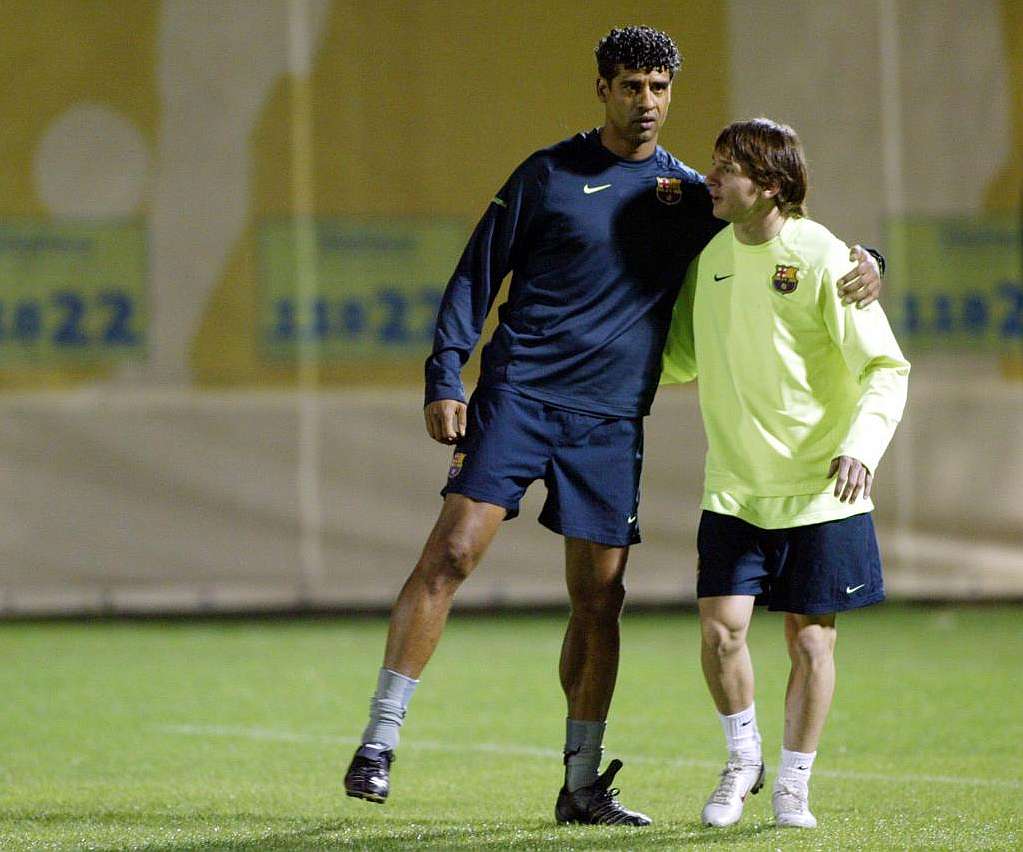 Frank Rijkaard & Lionel Messi 